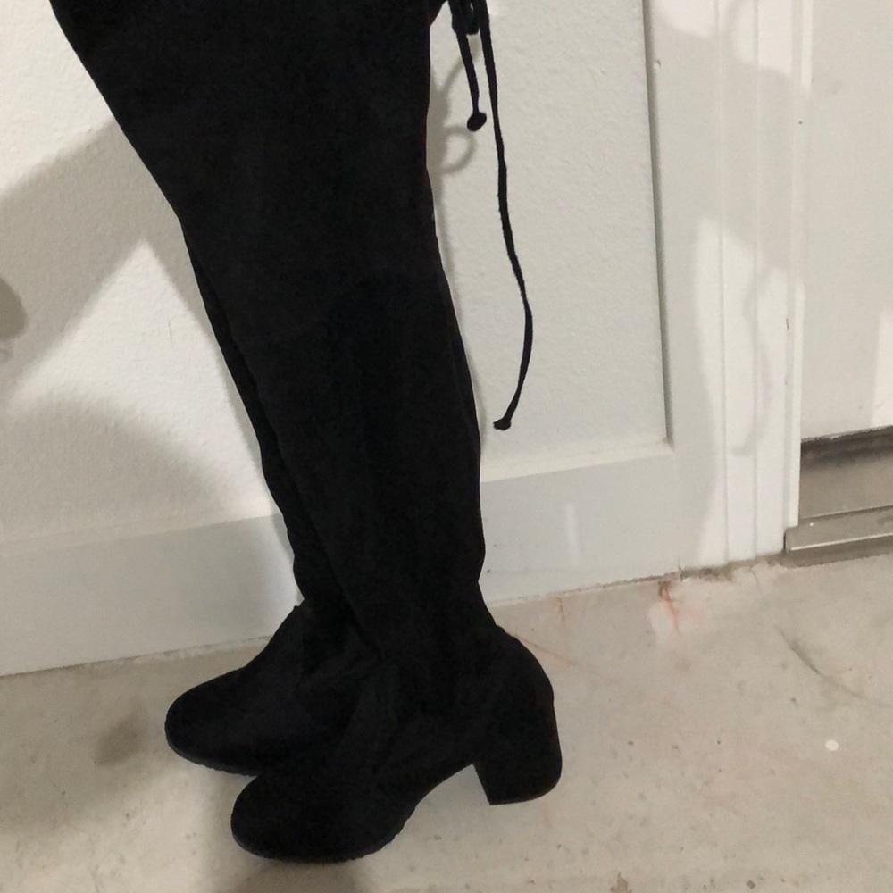 Thought high black boots